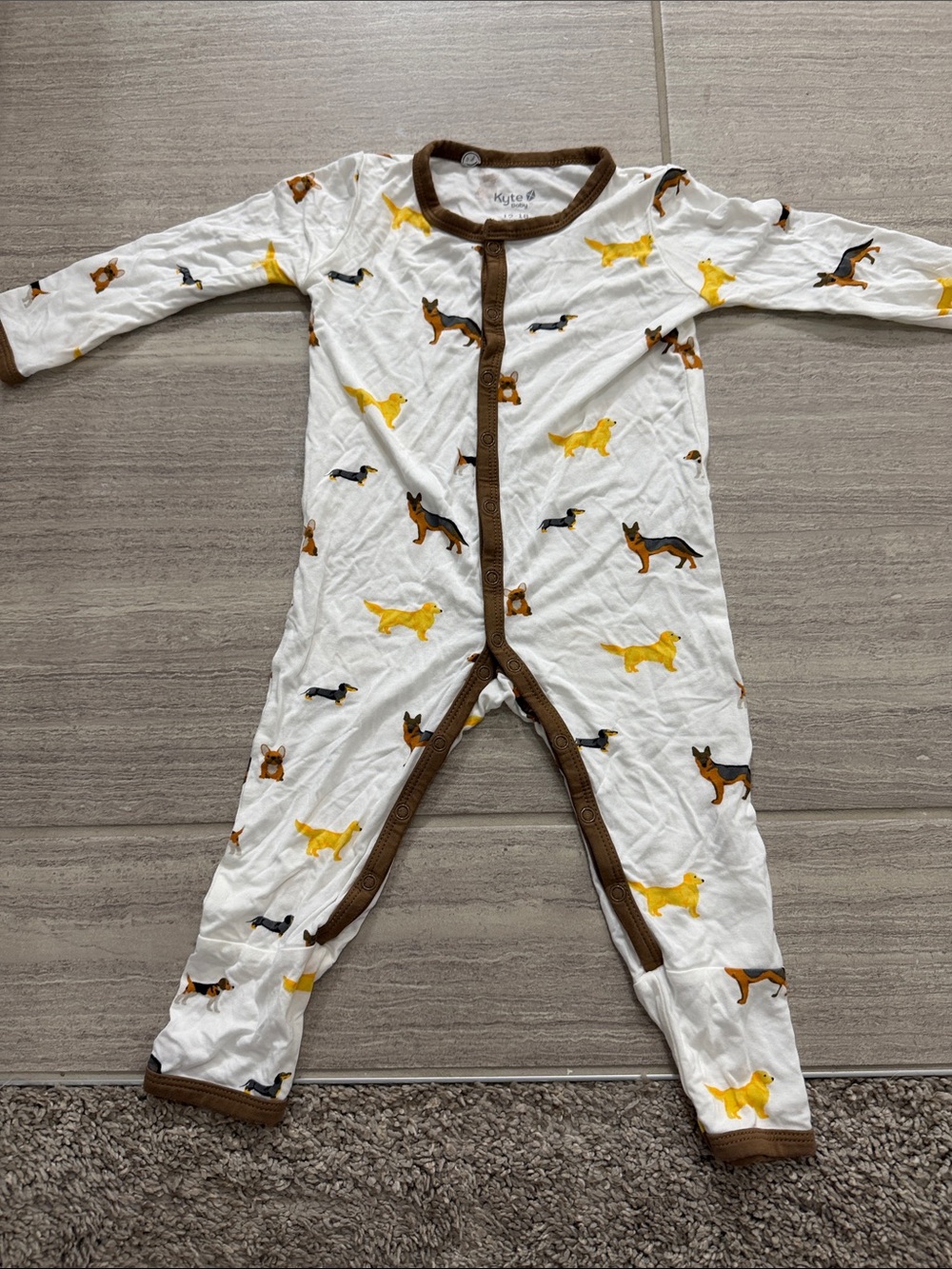 Kyte BABY White One-Piece Footie with Brown Trim and Dog Print